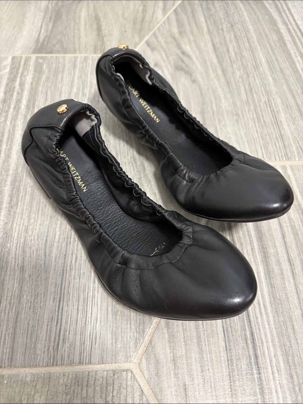 Stuart Weitzman Black Leather Elastic Ballet Flats with Gold Logo
